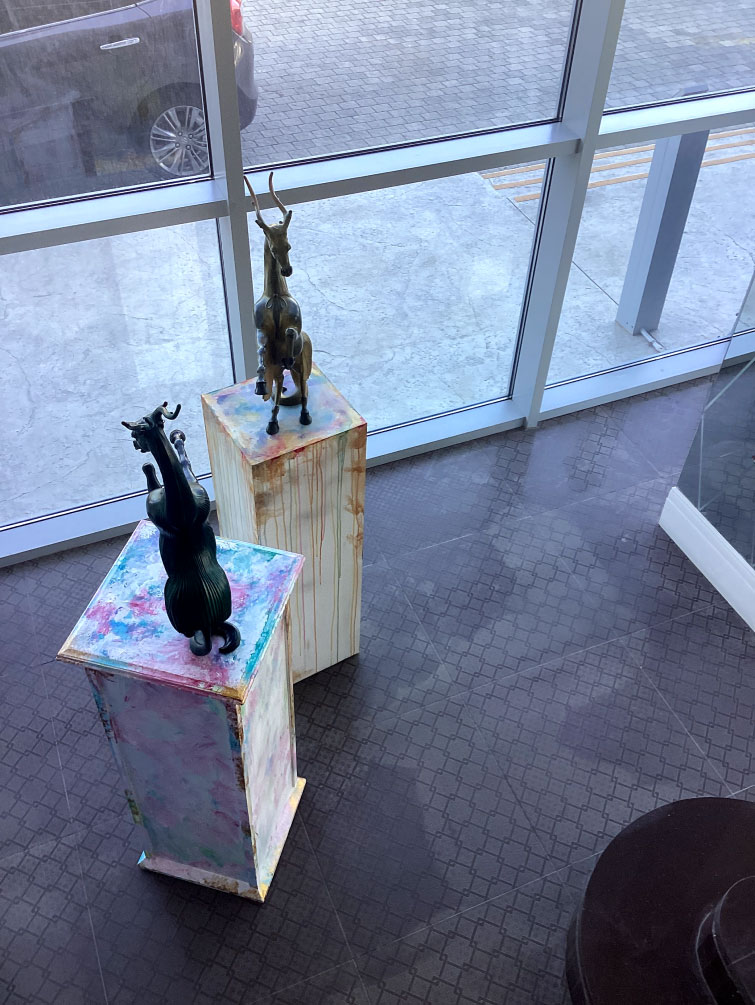 a group of statues in a room